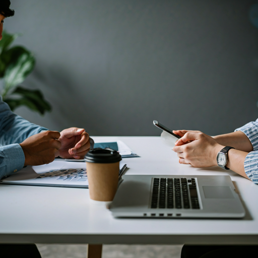 Modern minimalist design studio with team members discussing project requirements